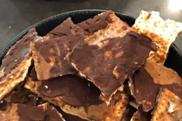 A bowl of chocolate-coated matzah toffee